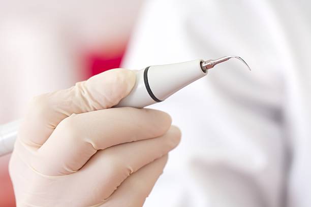 DTE D5 LED ultrasonic scaler mounted on the dental unit